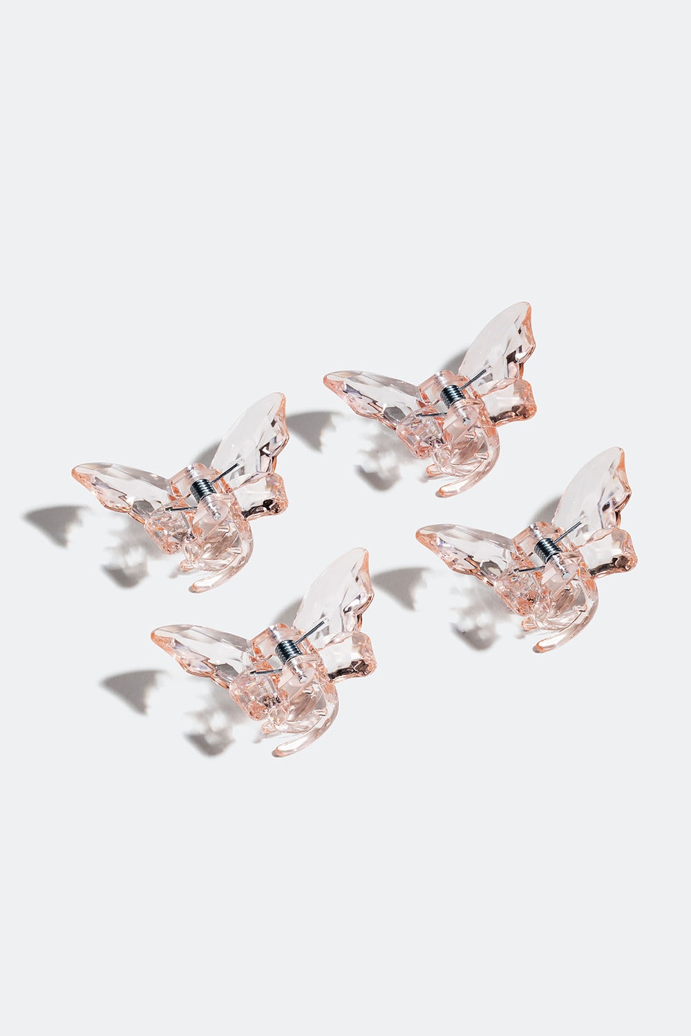 Pienet, pinkit hiussoljet, joissa perhosia, 4 kpl ryhmässä Hiustuotteet / Hiuspinnit ja -klipsit / Monipakkaus @ Glitter (331001565400)