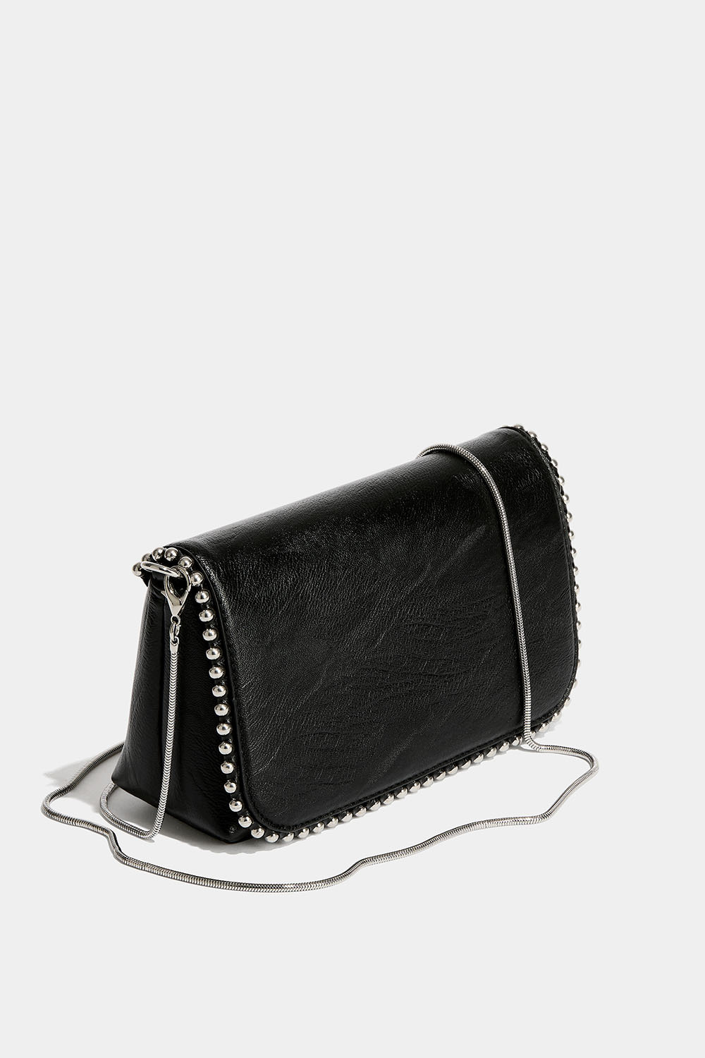 Musta kassi metallipalloilla