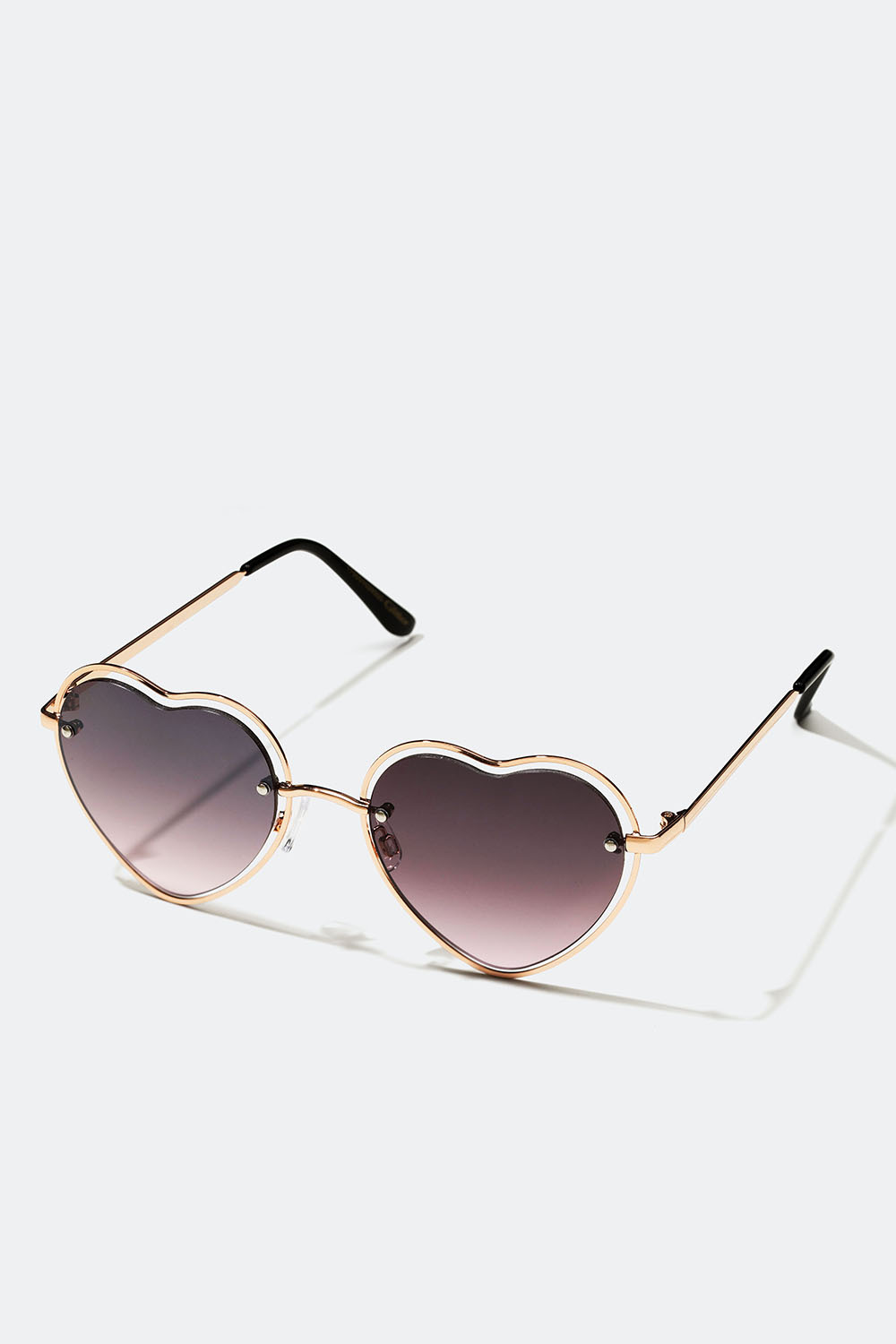Sydämenmuotoiset aurinkolasit