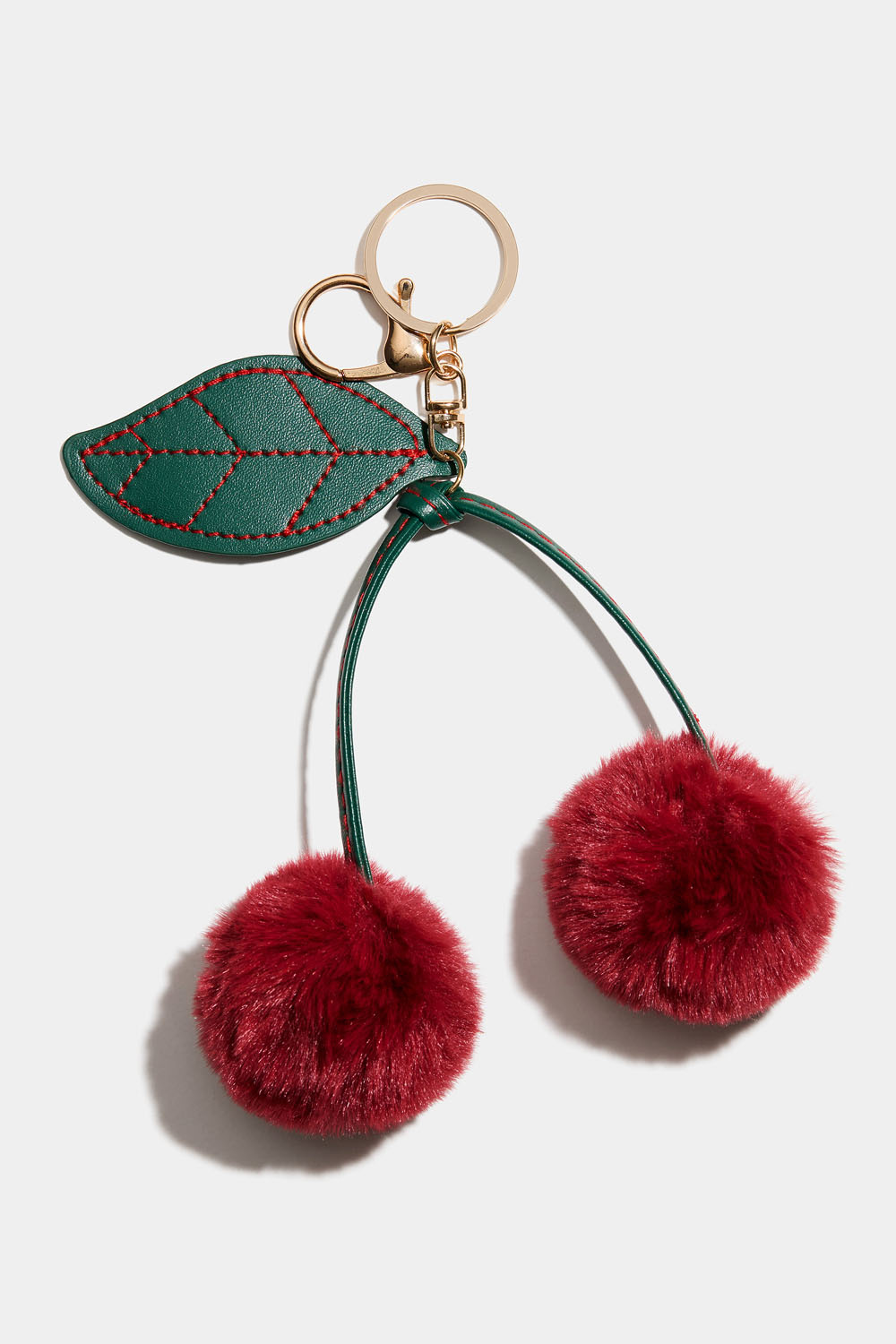 Laukkukoriste, jossa kirsikoita