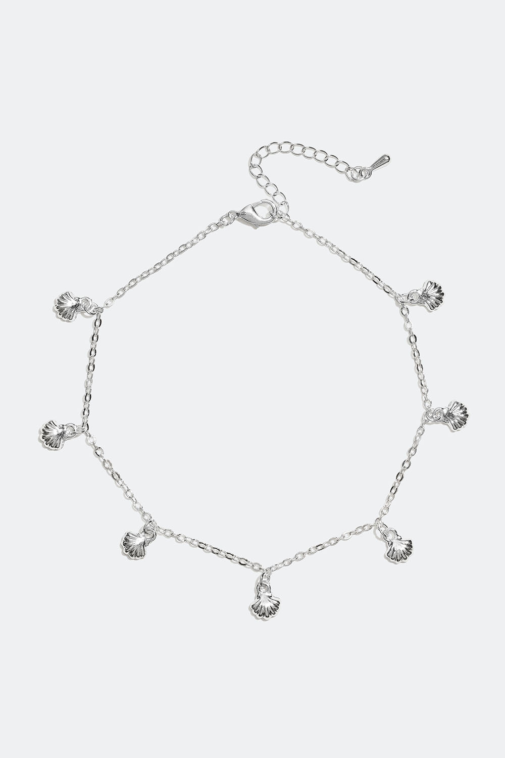 Nilkkaketju, jossa on simpukankuoria