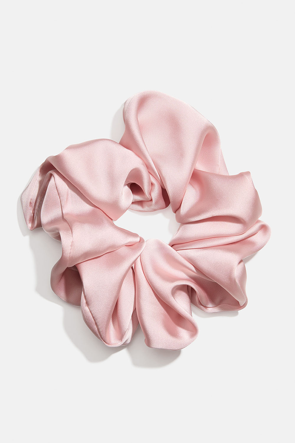 Iso vaaleanpunainen hiusdonitsi