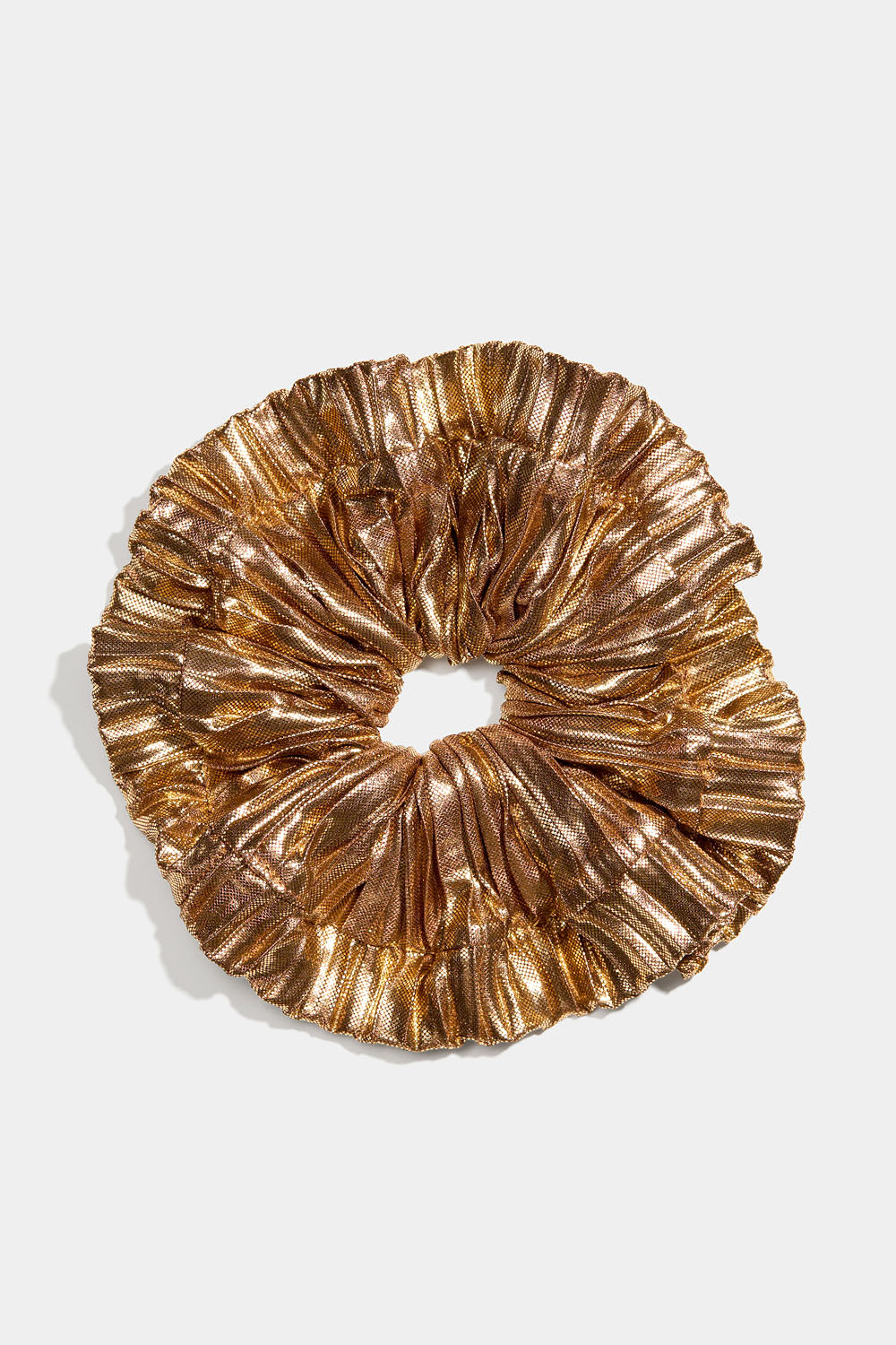 Kullanvärinen metallinhohtoinen hiusdonitsi