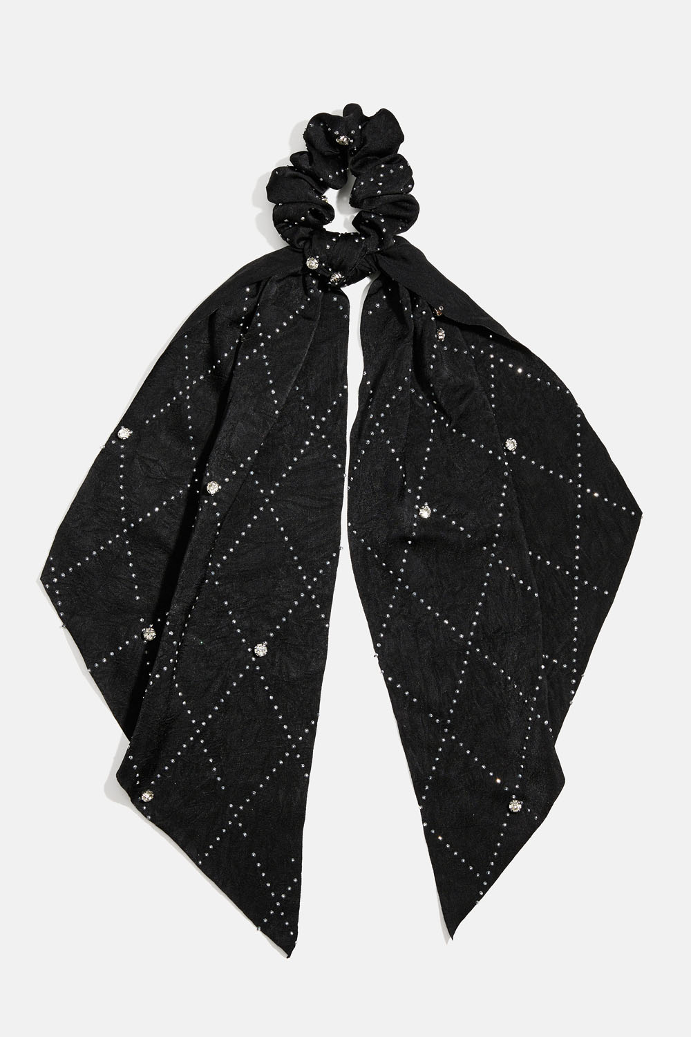 Hännällinen hiusdonitsi, jossa pieniä niittejä ja kiviä