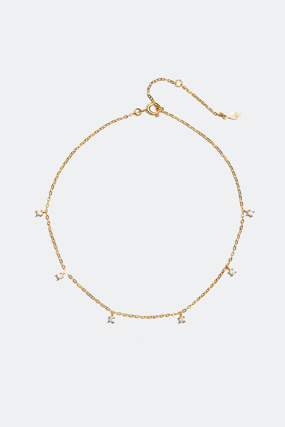 Nilkkakoru Cubic Zirconia -kivillä, 18 karaatin kultaus