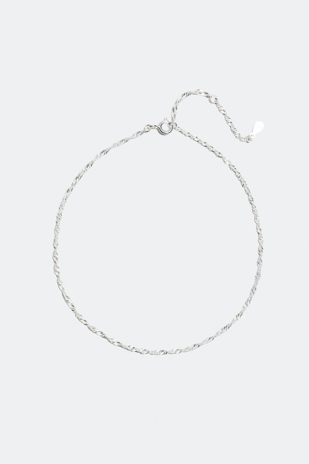 Nilkkakoru, hopeaketju kierteellä