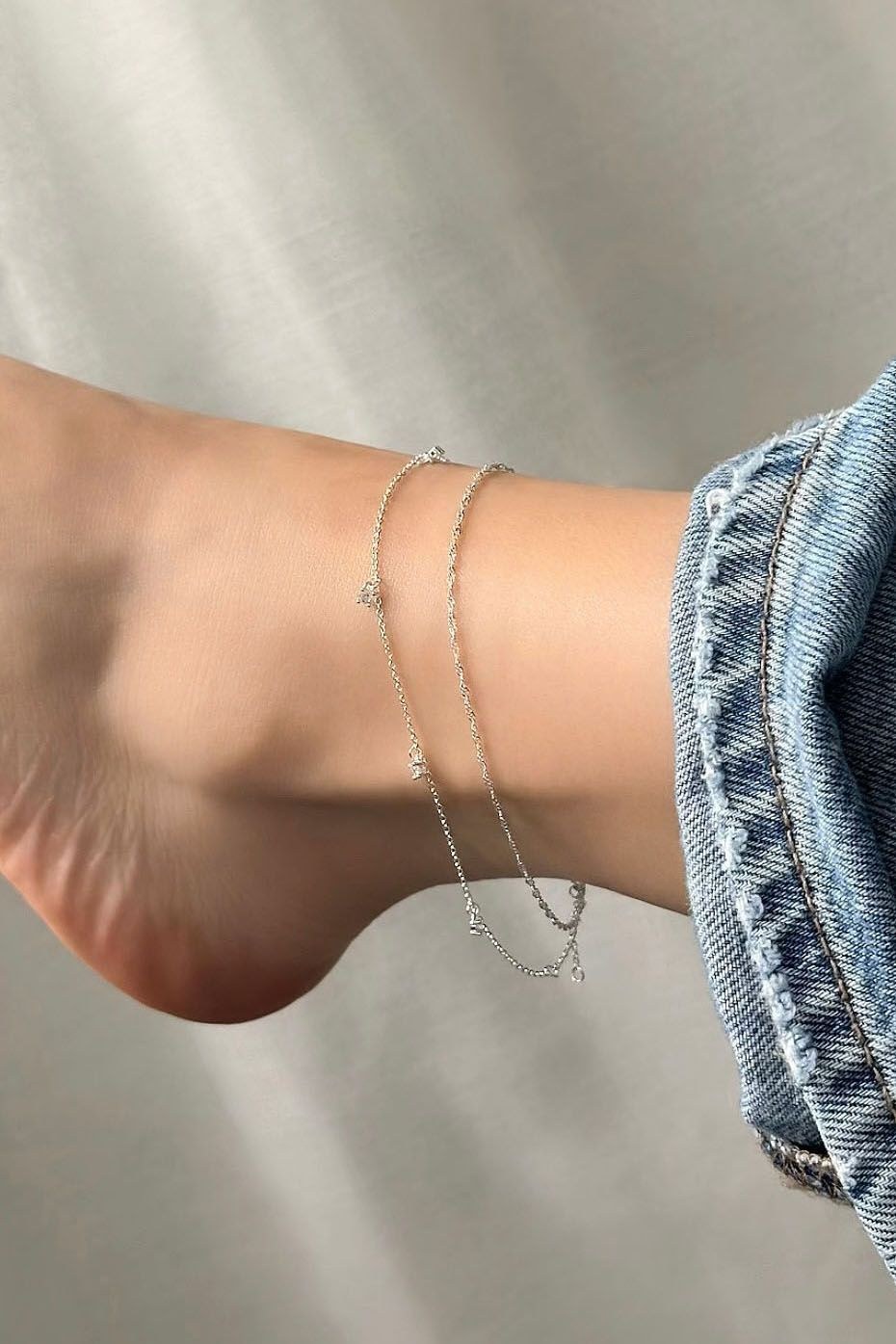 Nilkkakoru, hopeaketju kierteellä