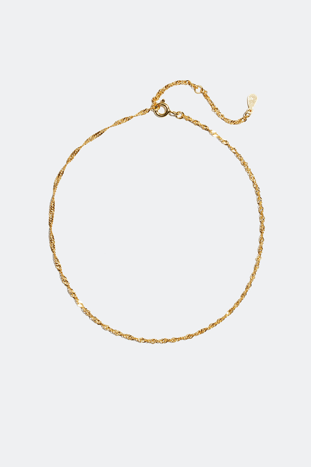 Nilkkakoru, kierteellä 18 karaatin kultaus